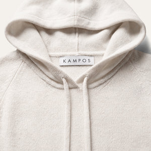 Close-up detail of the refined white KAMPOS cashmere hoodie