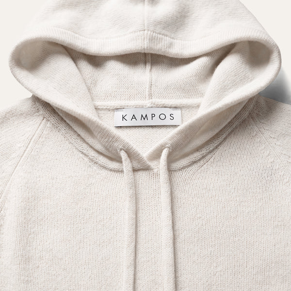 Close-up detail of the refined white KAMPOS cashmere hoodie
