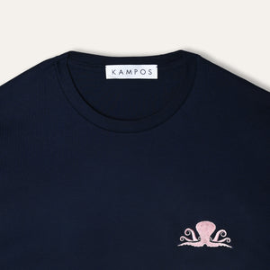 Close-up of the pale pink and white octopus motif on the KAMPOS navy T-shirt